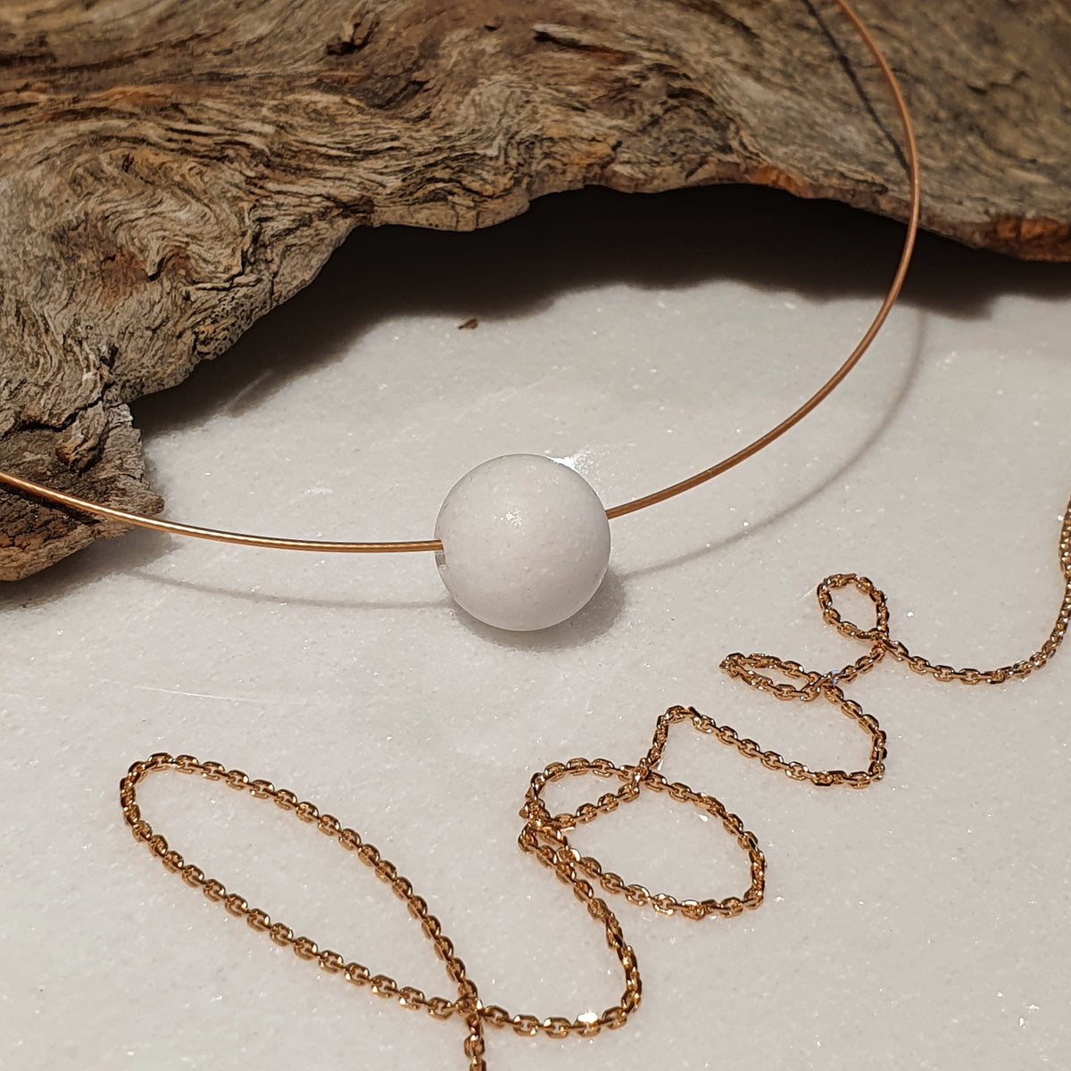 Rose necklace with marble ball