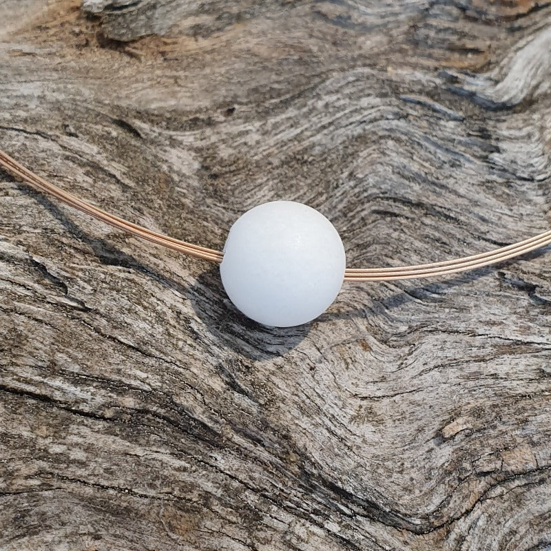 Rose necklace with marble ball