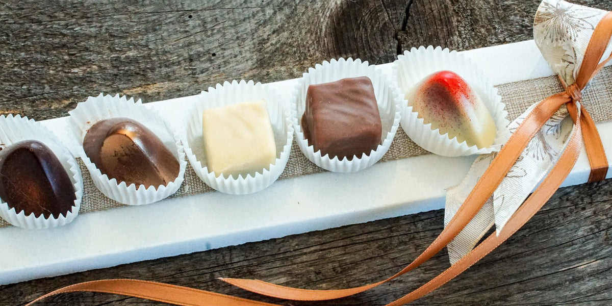 Pralines on a marble slab from Lasa, 12 bars